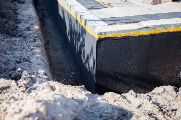 Professional Waterproofing technician working in Lyons, MI